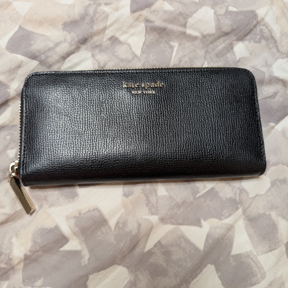 Kate Spade black zip-around pebbled leather wallet